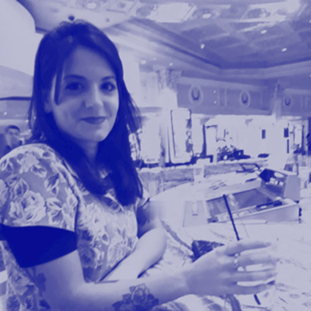 A blue-toned portrait at a bar